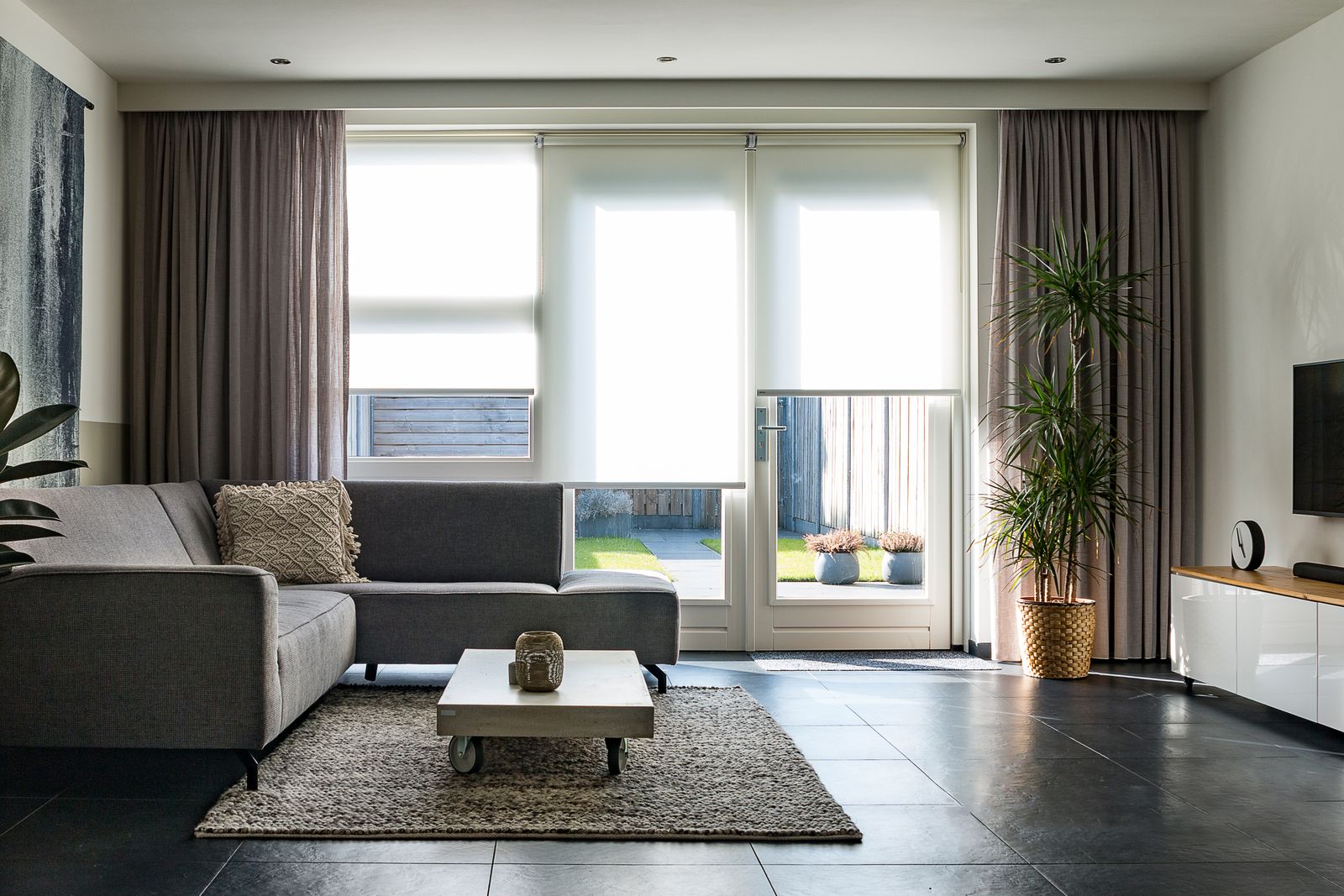 Bright contemporary apartment living room; illustrative image, not North Randolph Street